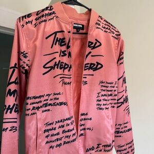 Pink faith-based jacket.